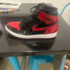 Air Jordan High-Top Sneakers in Black and Red