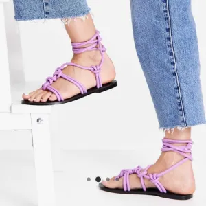 ASRA Shobha knotted flat sandals with ankle ties