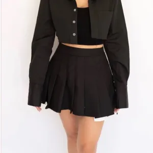 Battles and Butterflies. Black Pleated. Tennis Skirt Peek-a-boo White Pockets. S