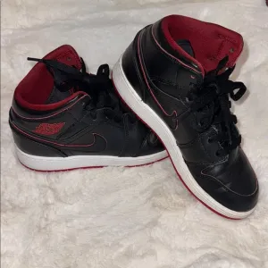 Black and Red Nike High-Top Sneakers