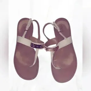Coach &quot;Cassidy&quot; cream and gold metal buckle thong flat sandals 8
