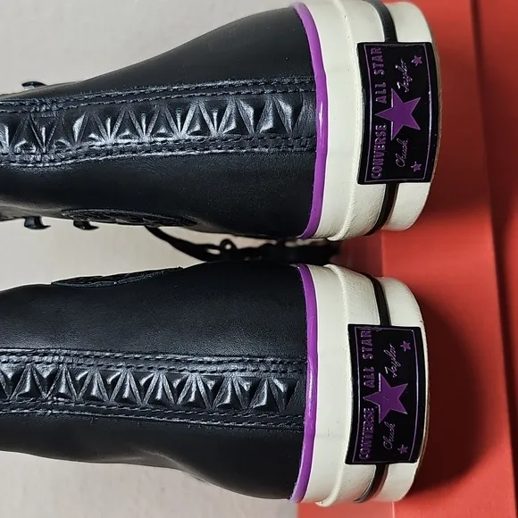 Converse Leather Black and White High-Top Sneakers