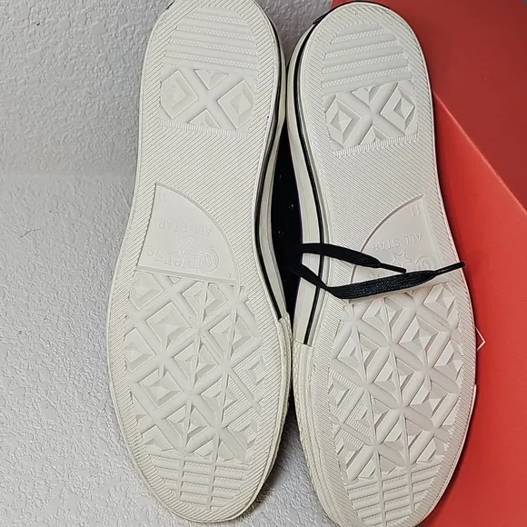 Converse Leather Black and White High-Top Sneakers