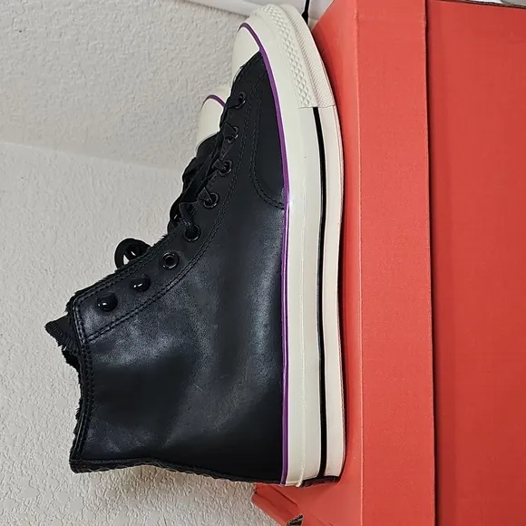 Converse Leather Black and White High-Top Sneakers