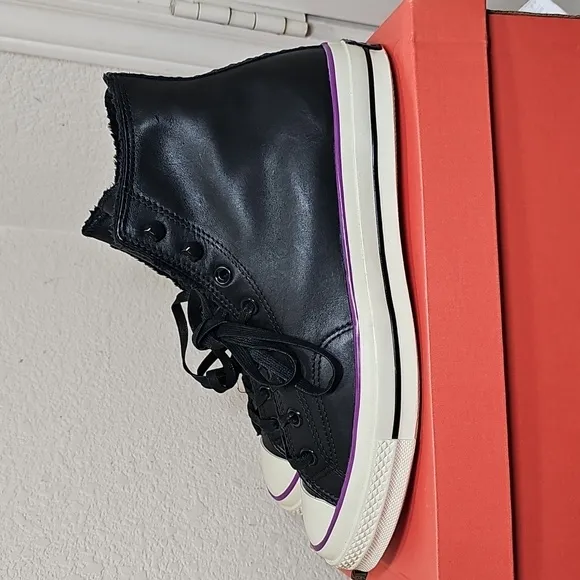Converse Leather Black and White High-Top Sneakers