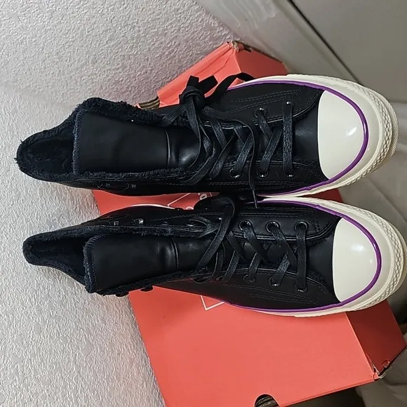 Converse Leather Black and White High-Top Sneakers