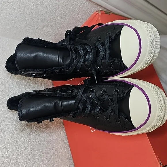 Converse Leather Black and White High-Top Sneakers