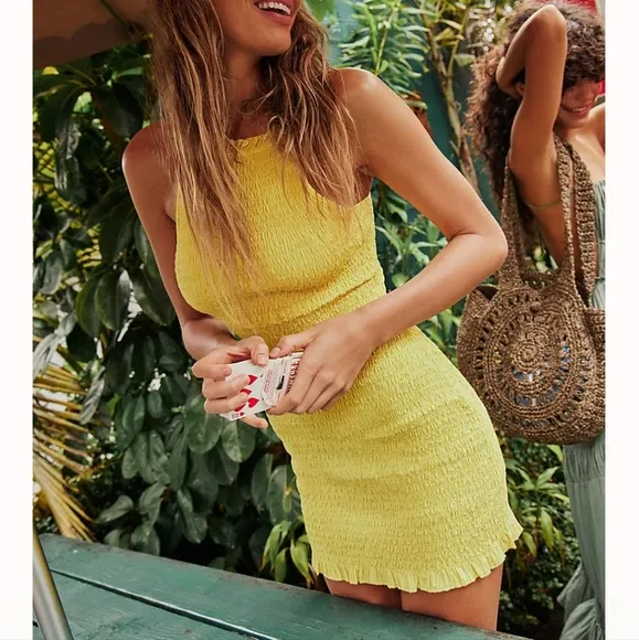 Free People Iyla Smocked Mini Dress in Blazing Yellow