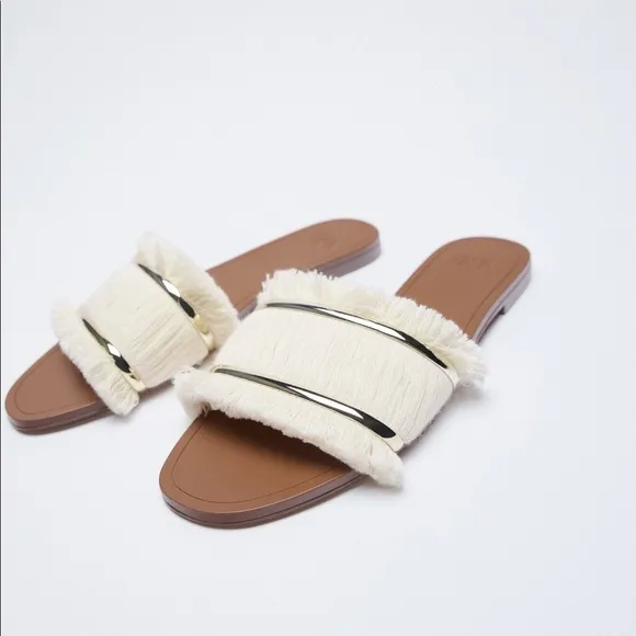 FRINGED FLAT SANDALS