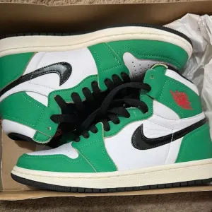 Green and White High-Top Sneakers with Black Accents