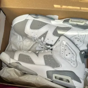 Jordan 6 Retro White and Gray High-Top Sneakers