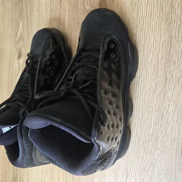 Jordan Black Sneakers with Chunky Midsole and Modern Aesthetic
