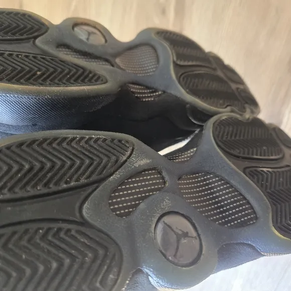 Jordan Black Sneakers with Chunky Midsole and Modern Aesthetic