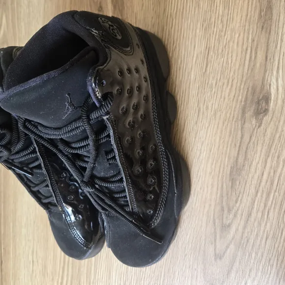 Jordan Black Sneakers with Chunky Midsole and Modern Aesthetic