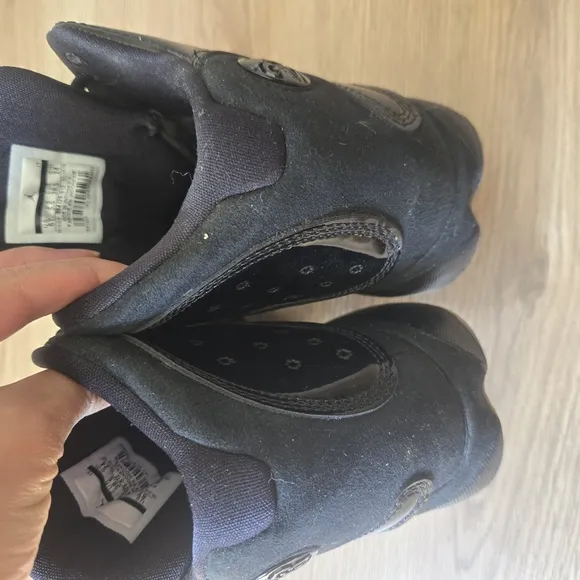 Jordan Black Sneakers with Chunky Midsole and Modern Aesthetic
