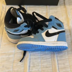 Jordan Blue and White High-Top Sneakers