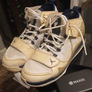 Jordan High-Top White and Tan Sneakers