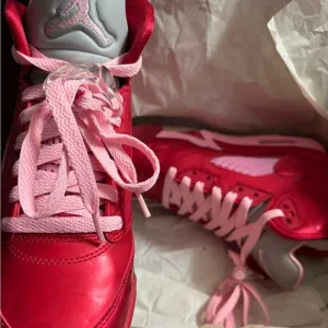 Jordan Red and Pink High-Top Sneakers