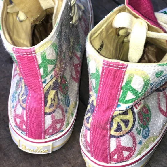 Justice Converse high top sneakers