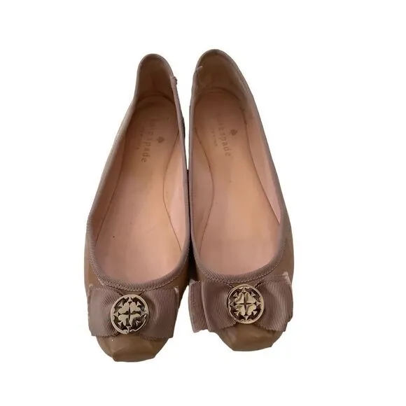 Kate Spade Slip on patent leather bow flats tan with medallion size 6M