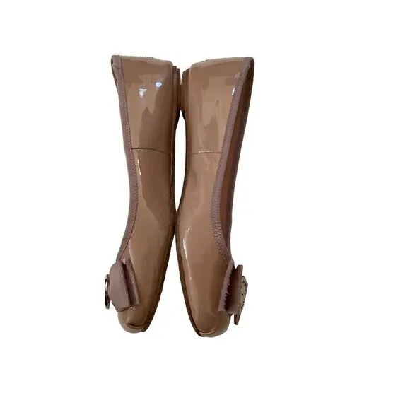 Kate Spade Slip on patent leather bow flats tan with medallion size 6M