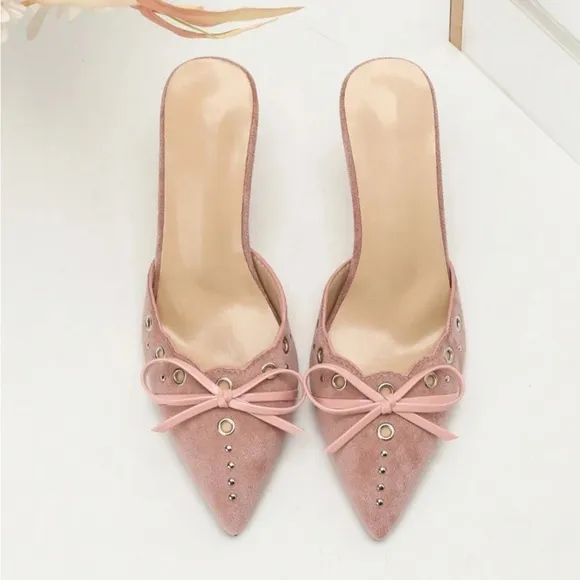 Light pink studded bow faux suede pointed toe mule heels