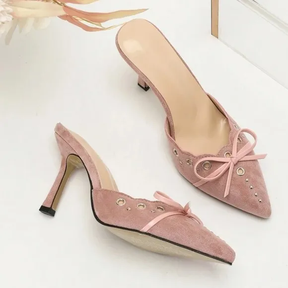 Light pink studded bow faux suede pointed toe mule heels