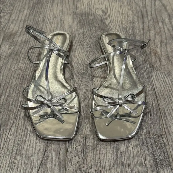 New Reformation silver Maya bow sandals