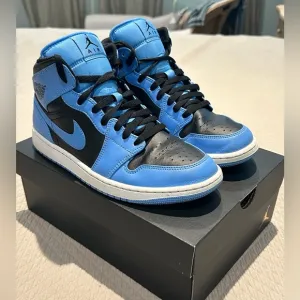 Nike Air Jordan mid top sneakers