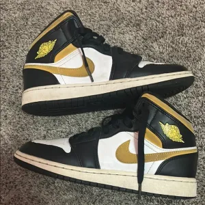 Nike Black and Gold High-Top Sneakers
