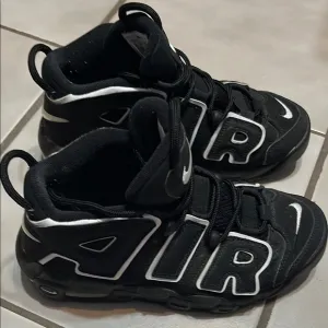 Nike Black and White High-Top Sneakers with Chunky Design