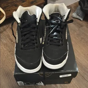 Nike Black and White High-Top Sneakers