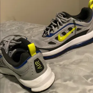 Nike Gray and Blue Sneakers with Modern Silhouette