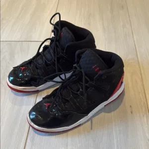 Nike Jordans Kids Black and Red High-Top Sneakers, size 2