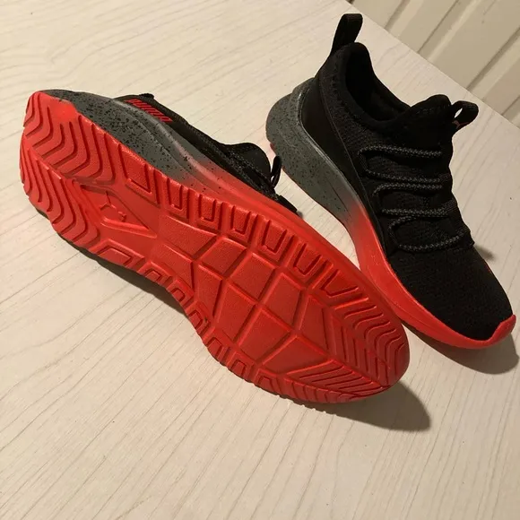 NWOB Puma Black Sneakers with Red Accents