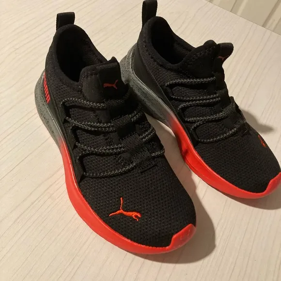 NWOB Puma Black Sneakers with Red Accents