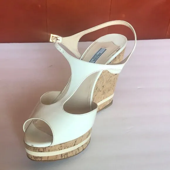 PRADA: Off-White Patent Leather Cork Wedge Sandals EU 40 / US 9 1/2