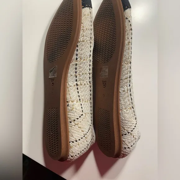 Rothy's Black and Cream Pointed Toe Flats