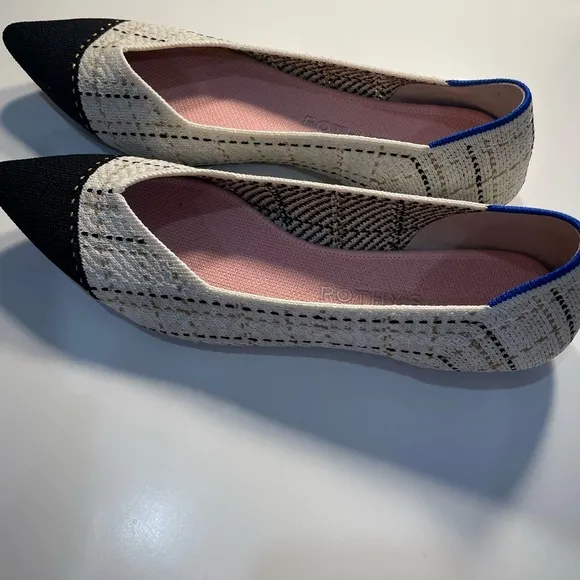 Rothy's Black and Cream Pointed Toe Flats
