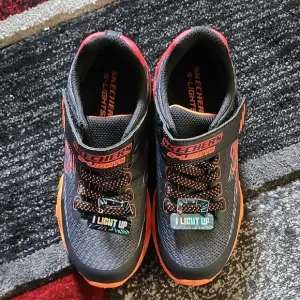 Skechers Black and Orange High-Top Sneakers with Velcro Strap