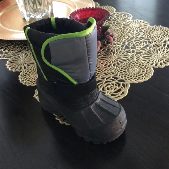 Snow suit and snow boots.