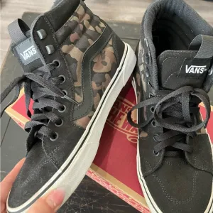 Vans Black High-Top Sneakers