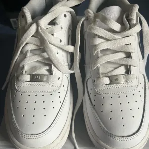 White AF1 Low-Top Sneakers